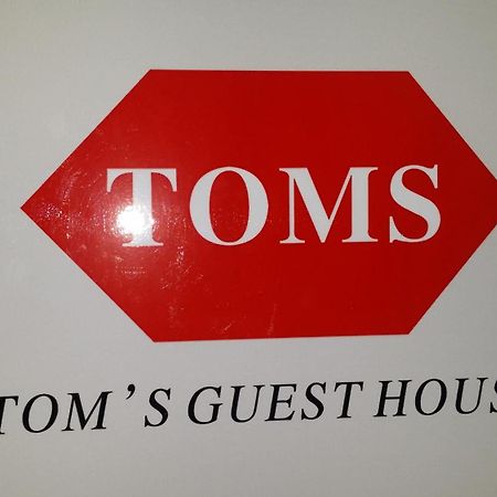 Tom'S Guest House Цзюлун Экстерьер фото