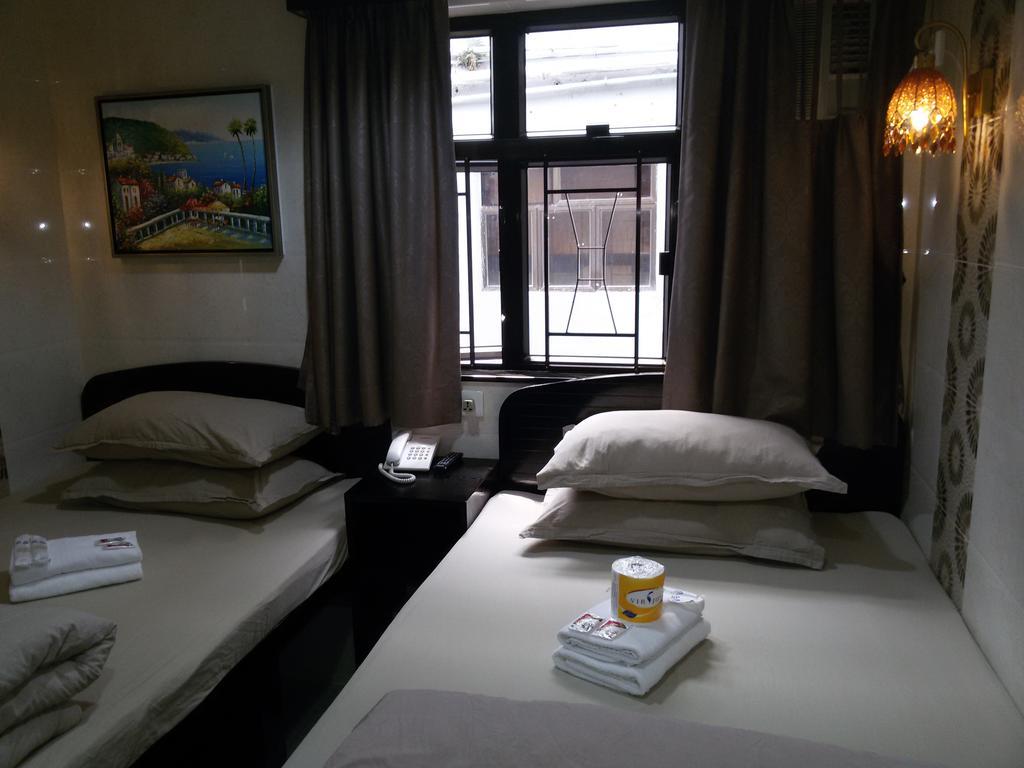 Tom'S Guest House Цзюлун Экстерьер фото