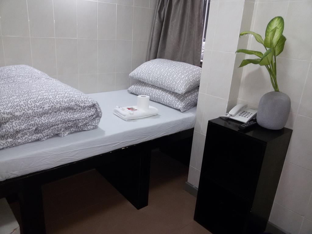 Tom'S Guest House Цзюлун Экстерьер фото