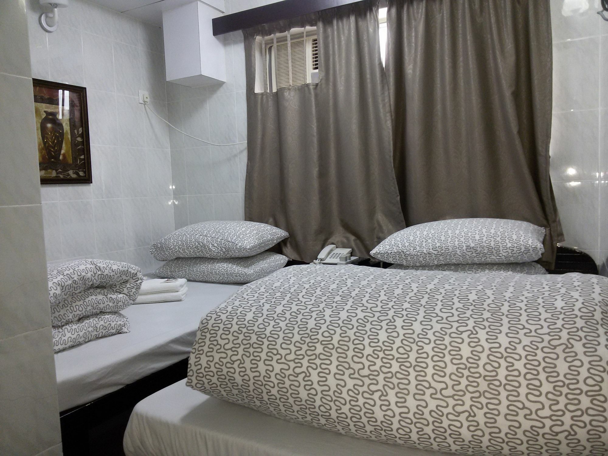 Tom'S Guest House Цзюлун Экстерьер фото