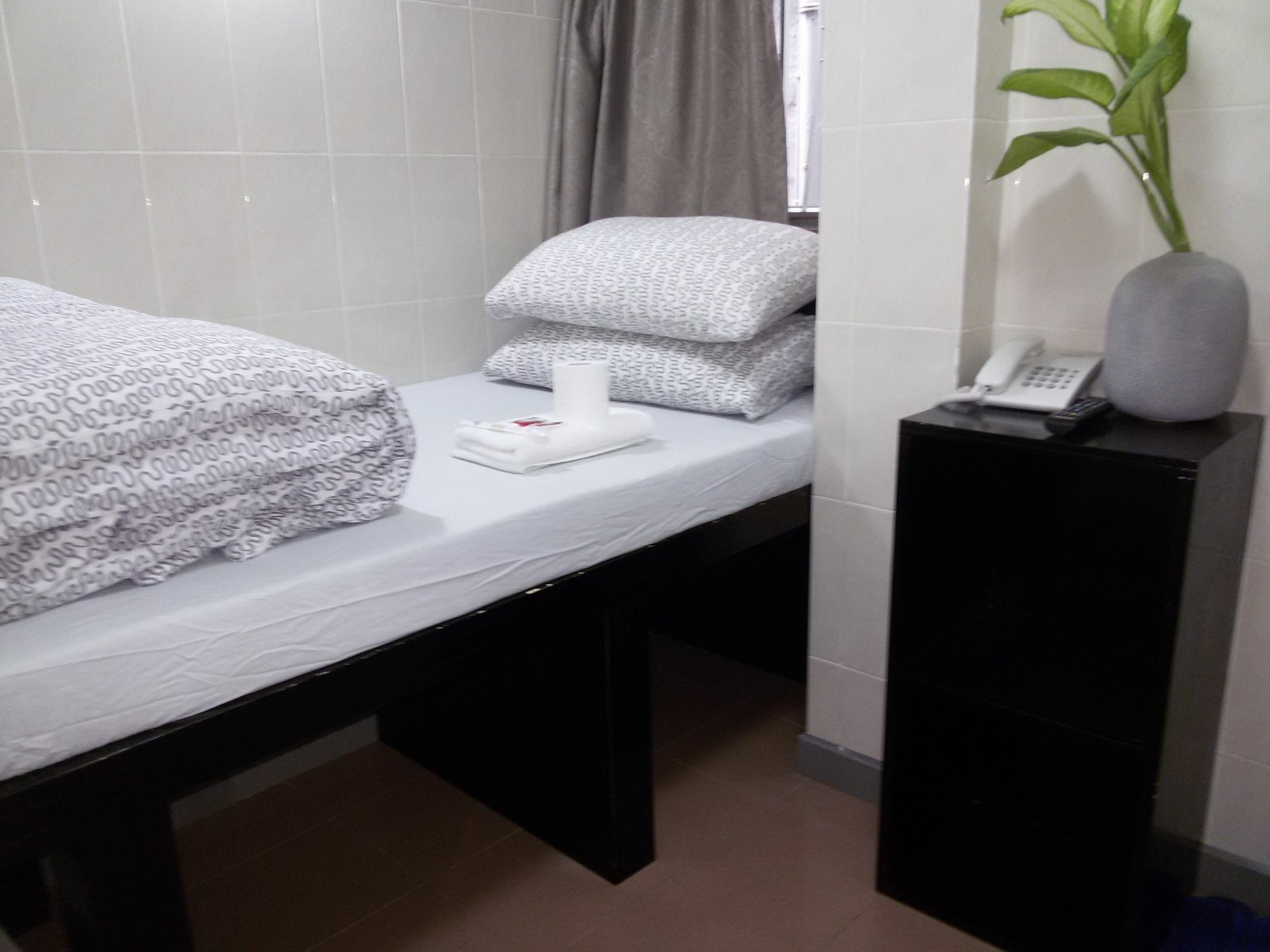 Tom'S Guest House Цзюлун Экстерьер фото